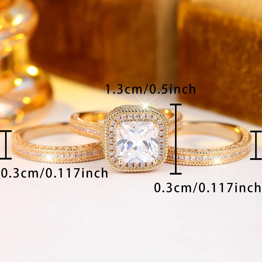 Anel ZENORY Lumière Royale — Zircônia Quadrada com Halo Dourado