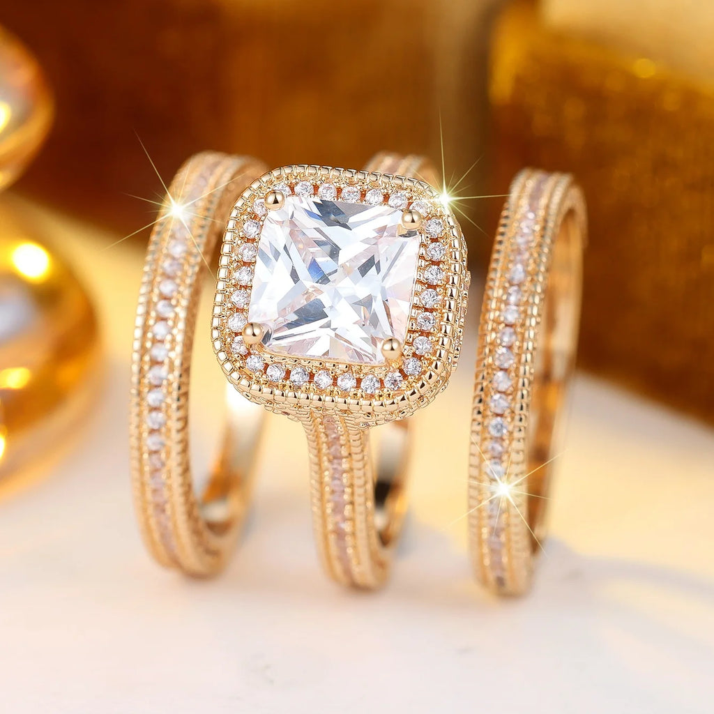 Anel ZENORY Lumière Royale — Zircônia Quadrada com Halo Dourado